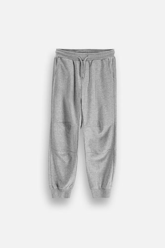 MOKIDA WEAR MOKIDA WEAR Spodnie dresowe szare gładkie z wiązaniem w pasie rozmiar 164 dla chłopca