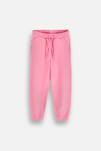 MOKIDA WEAR MOKIDA WEAR Spodnie dresowe różowe z wiązaniem w pasie rozmiar 116 dla dziewczynki